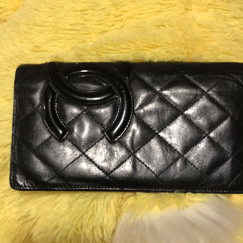 Crossbody Chanel wallet I sometimes put my iPhone in its pocket I hate to part